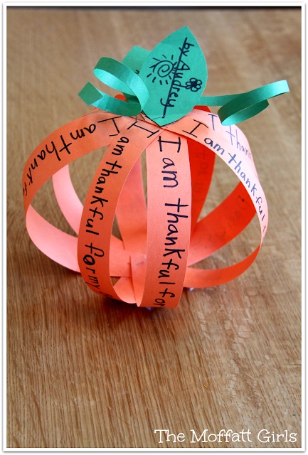 Have students write what they are thankful for on strips of orange paper and then use a fastener to turn them into a pumpkin! Such an easy Thanksgiving Day craft!