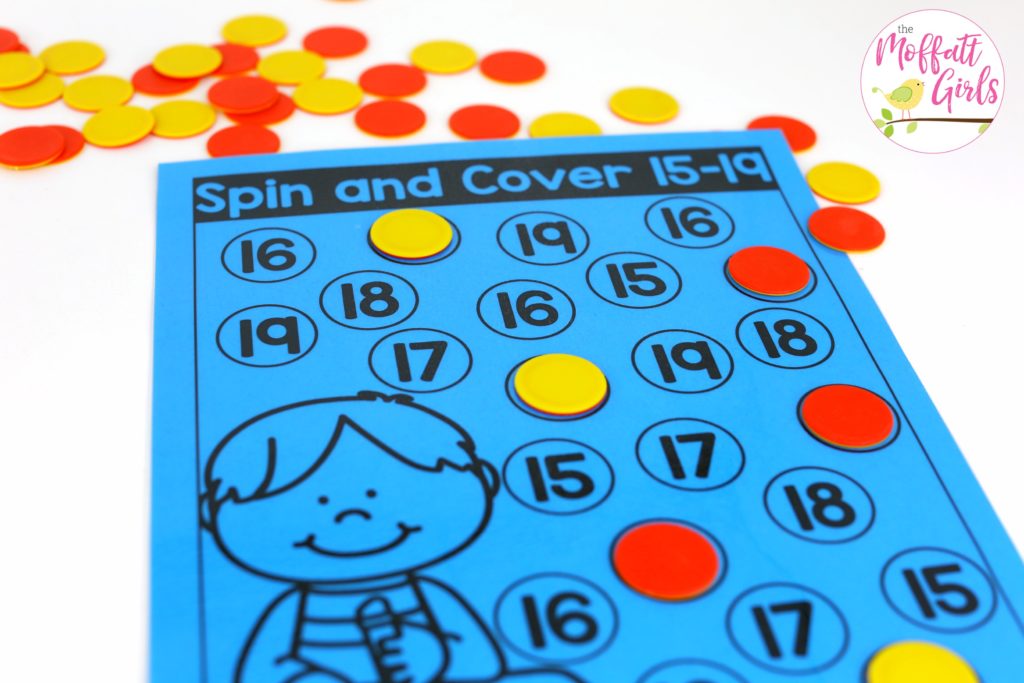 Spin and Cover- such a fun place value math game! Teach base ten math with these hands-on math centers for Kindergarten!