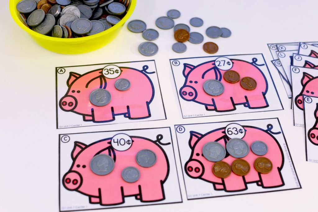Money Games- Count up coins to match the value on the piggy bank. Such a fun math center for 1st graders!