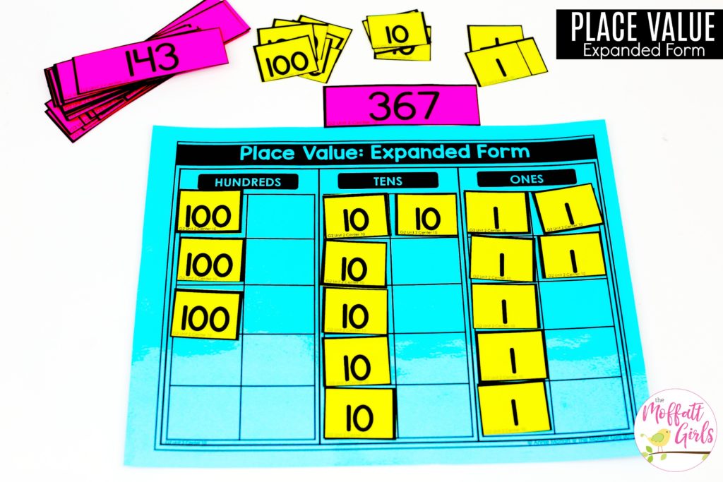 Place Value: Expanded Form- Flip a card and build the number in expanded form. Tons of fun math centers to teach place value in Second Grade!