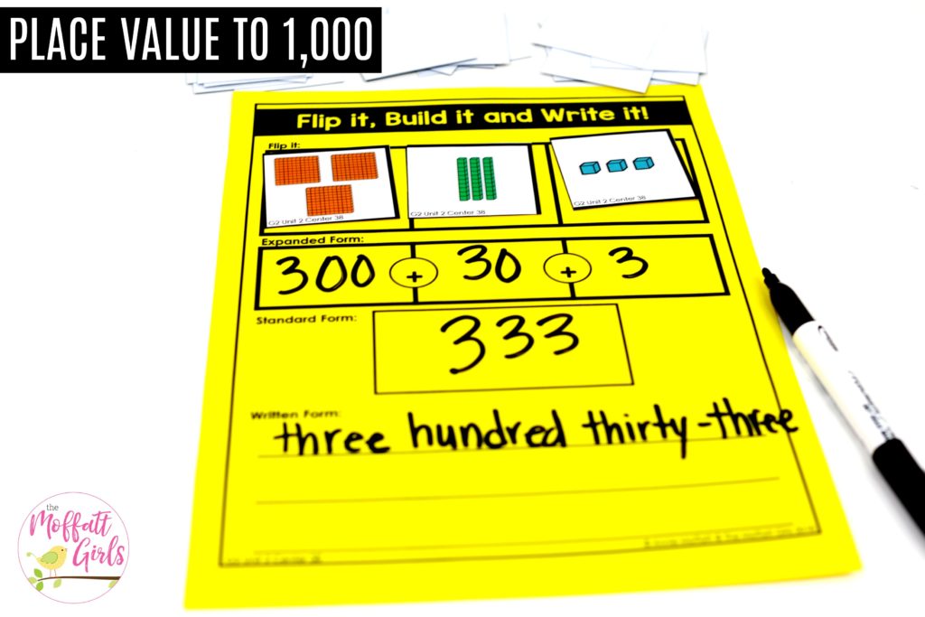 Flip it, Build it and Write it- place value math center to teach base ten blocks, expanded form and word form for numbers up to 1,000 in 2nd grade!